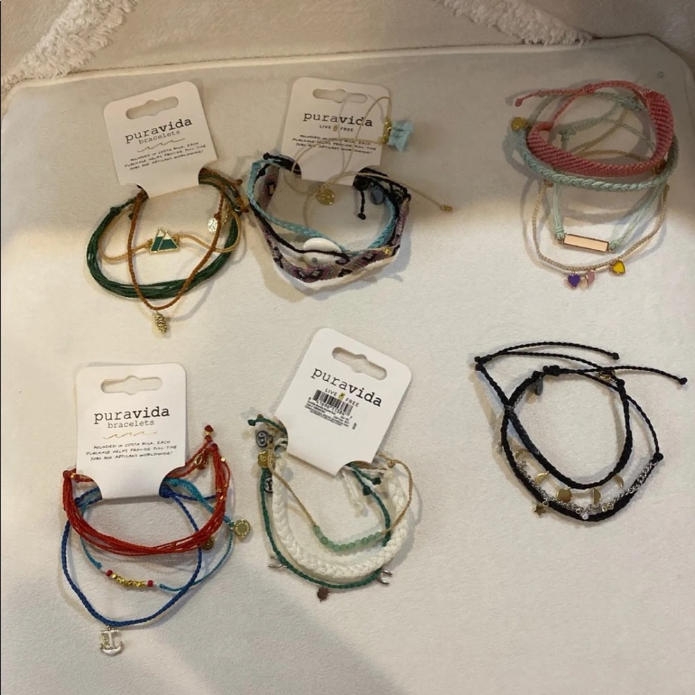 A bunch of pura vida bracelets some with tags!!